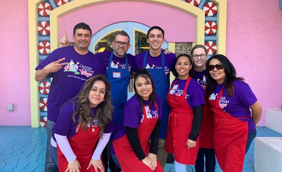 Employees helping out at Give Kids the World Village